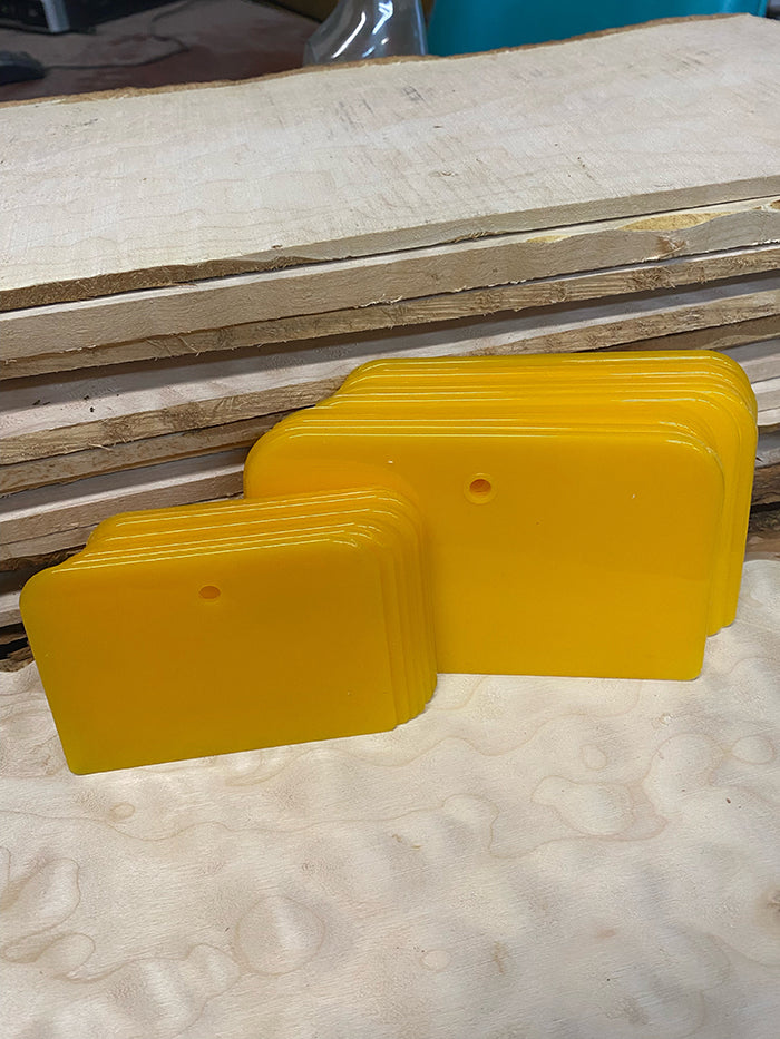 Spreaders for applying an oil finish